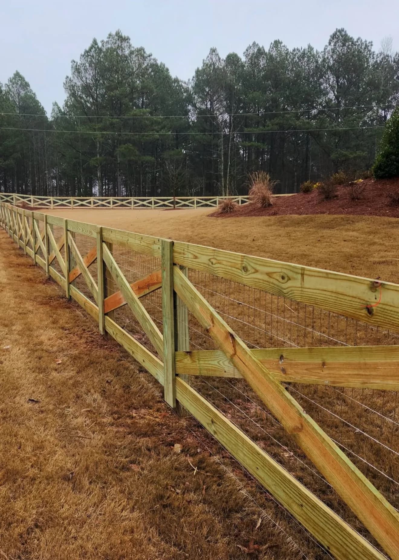 Farm and acreage mesh fence by A Class Fencing in the Alberta foothills